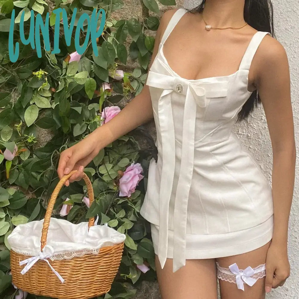 Lunivop Elegant Bow Patchwork White Dress French Gentle Low-cut Sleeveless Mini Dresses With Bodycon Skirts Women 2 Piece Set Y2K Clothe Trendy Cut-Out Mini Dress Lunivop Elegant Bow Patchwork White Dress French Gentle Low-cut Sleeveless Mini Dresses With Bodycon Skirts Women 2 Piece Set Y2K Clothe Trendy Cut-Out Mini Dress